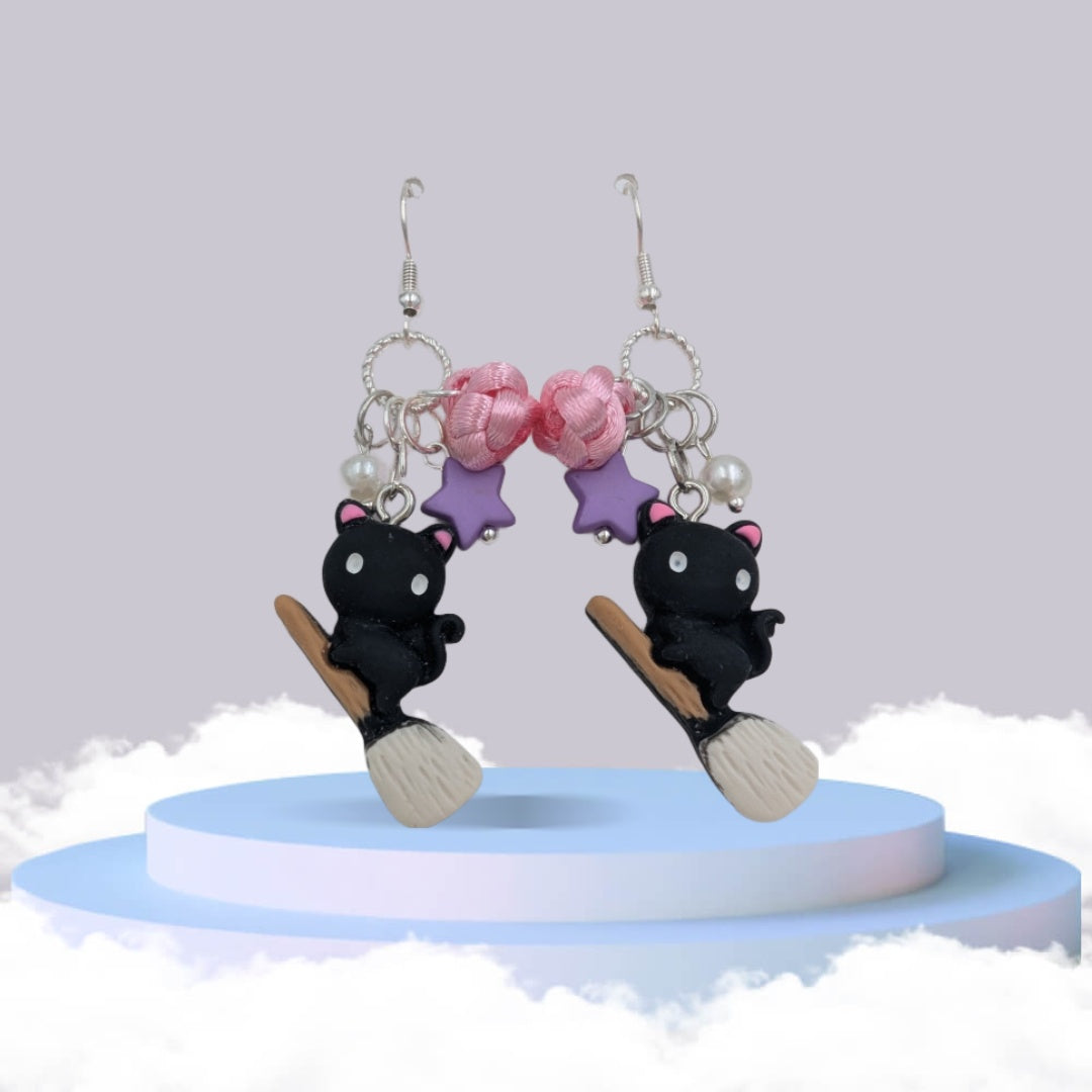 nœud diamant & petit chat sur balai de sorcière